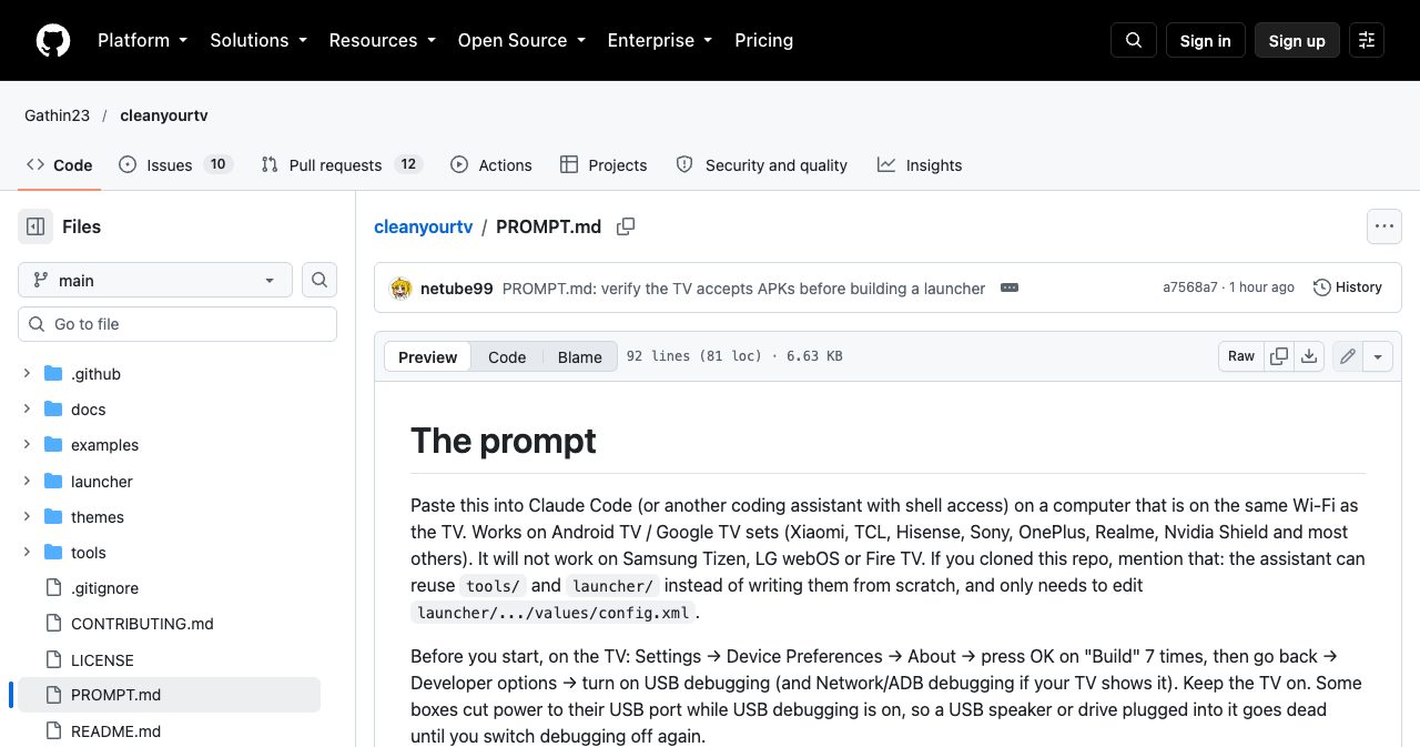 PROMPT.md in the cleanyourtv repo on GitHub, opening with instructions to paste it into Claude Code or another coding assistant with shell access, a note that it will not work on Samsung Tizen, LG webOS or Fire TV, and the steps to enable USB debugging on the TV