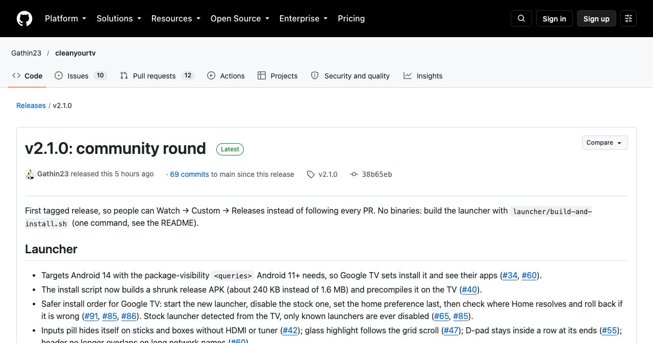 The v2.1.0 "community round" release of Gathin23/cleanyourtv on GitHub, the first tagged release, listing launcher changes: an Android 14 target, a shrunk release APK of about 240 KB, a safer Google TV install order and fixes from community pull requests
