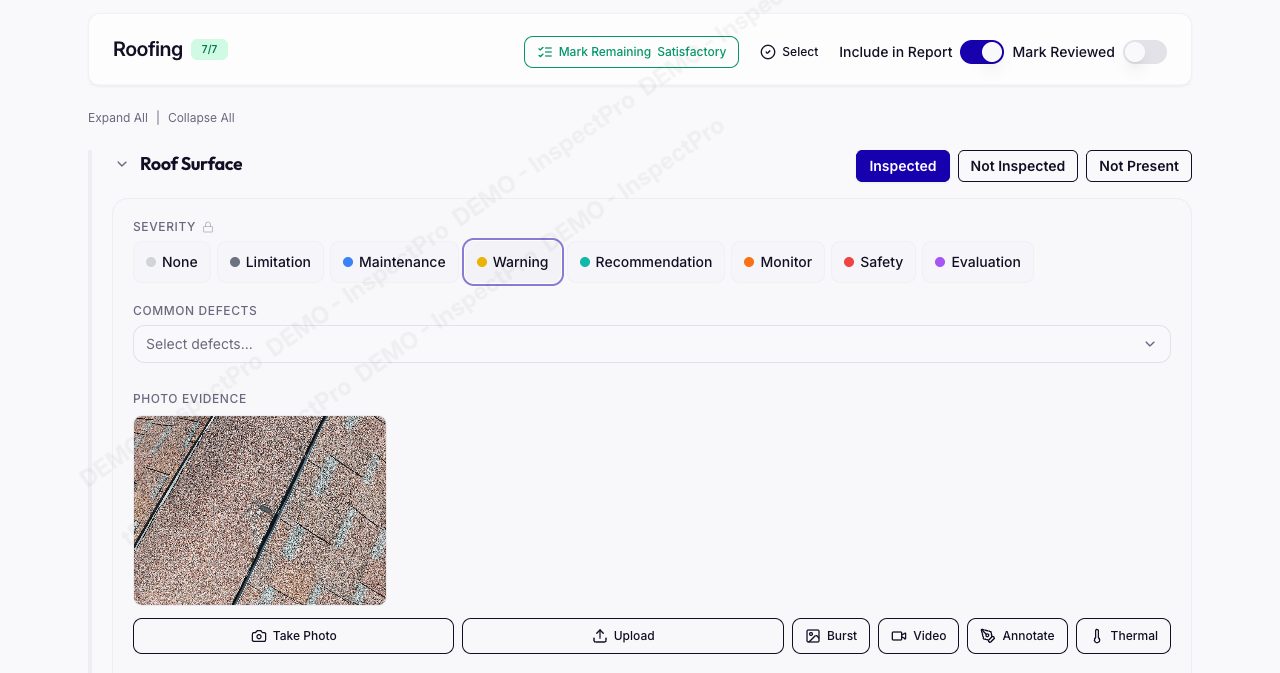 The InspectProHQ report builder in demo mode on the Roofing section, marked 7/7, with Mark Remaining Satisfactory, Include in Report and Mark Reviewed controls, Roof Surface set to Inspected, a severity row of None, Limitation, Maintenance, Warning, Recommendation, Monitor, Safety and Evaluation with Warning selected, a Common Defects drop-down, a shingle photo and Take Photo, Upload, Burst, Video, Annotate and Thermal buttons